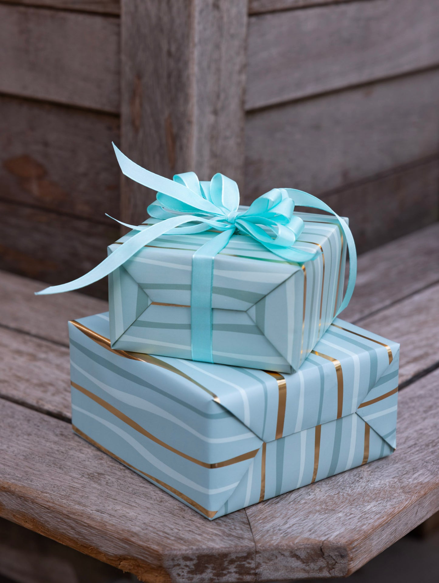 Festive Wave Print Wrapping Paper in Turquoise and Gold
