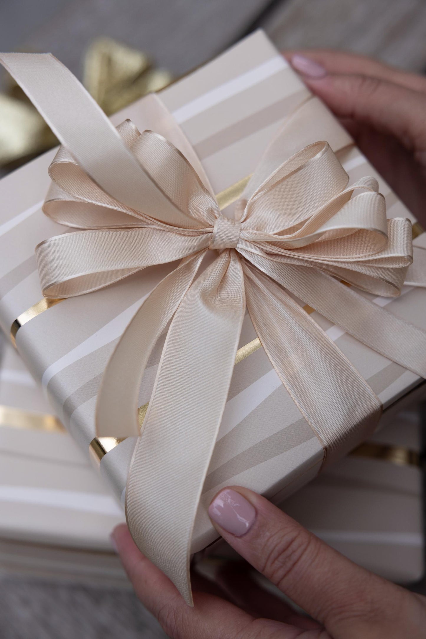 Festive Wave Print Wrapping Paper in Beige and Gold