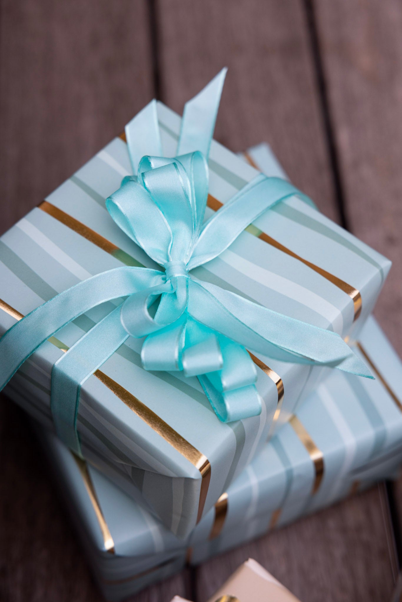 Festive Wave Print Wrapping Paper in Turquoise and Gold