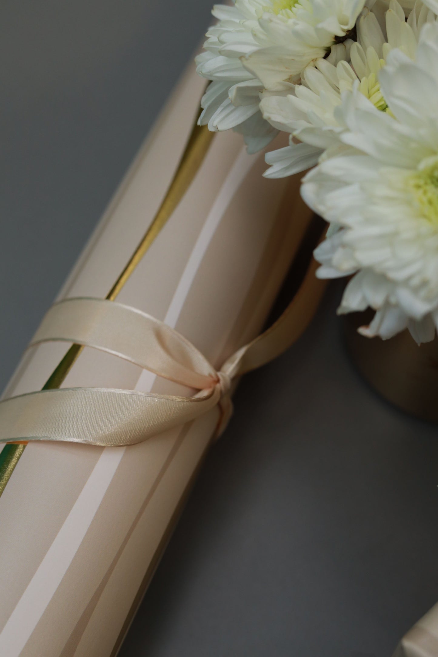 Festive Wave Print Wrapping Paper in Beige and Gold