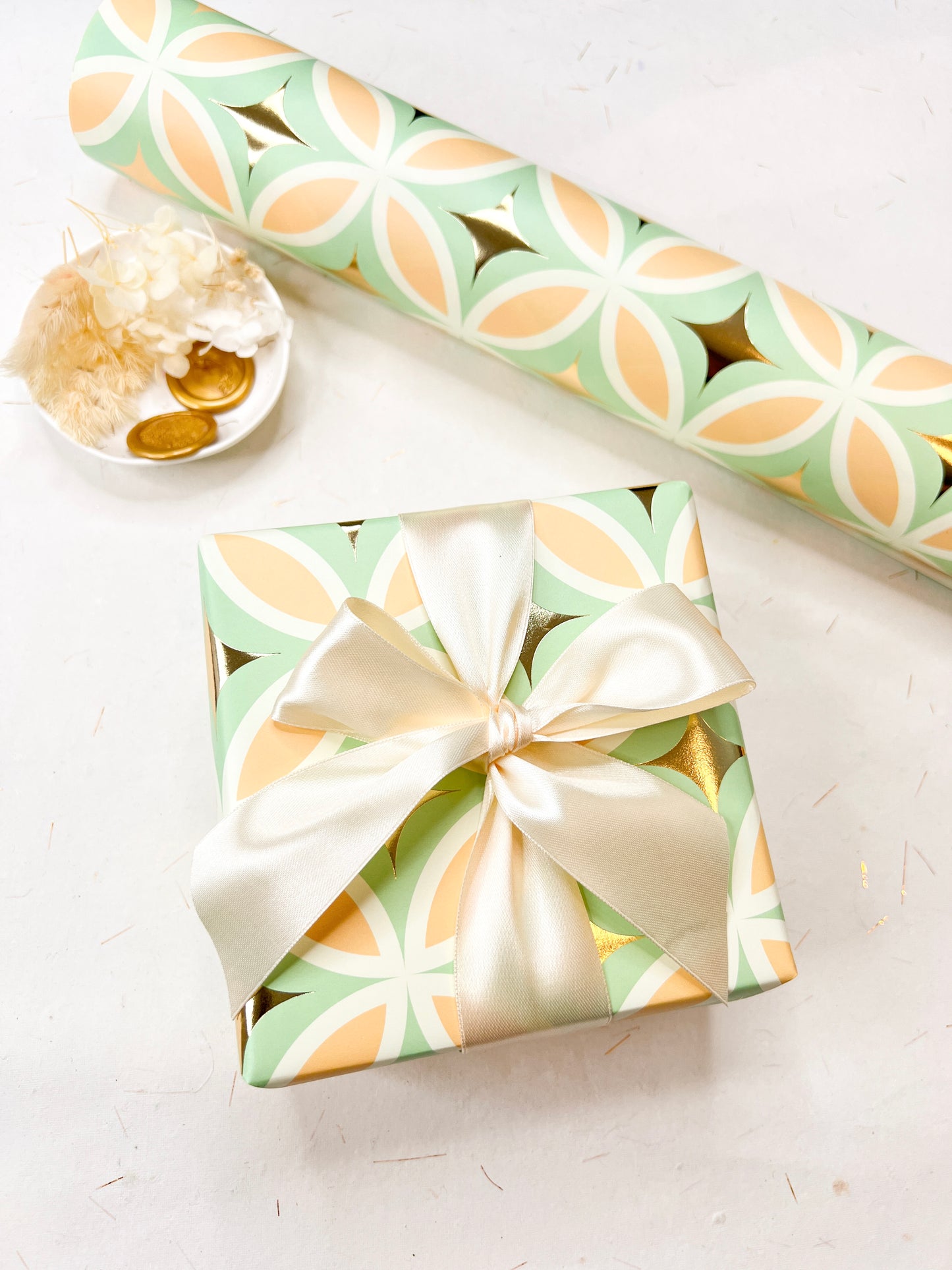 STAR BURST GOLD AND MINT WRAPPING PAPER