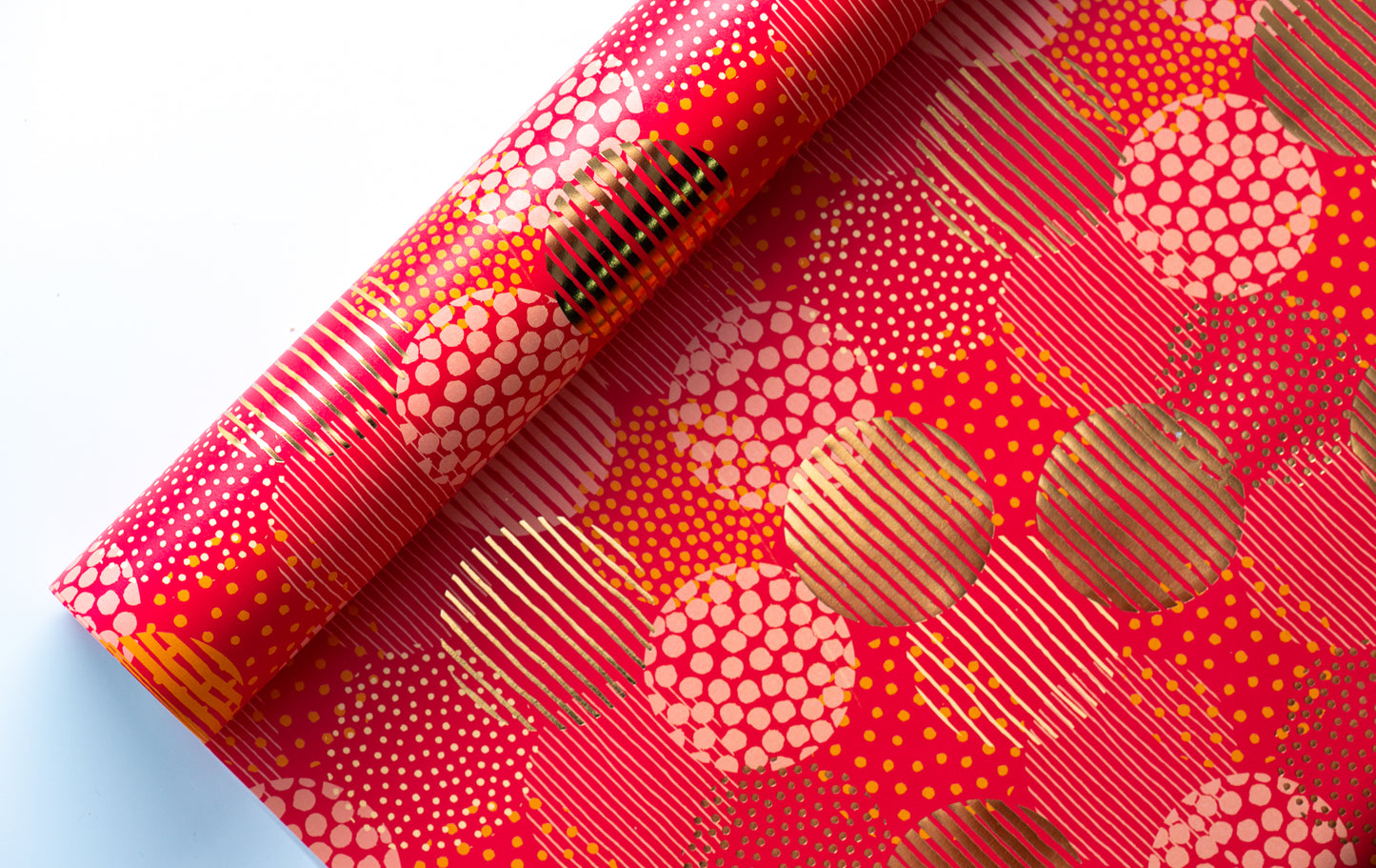 RASPBERRY & GOLD CIRCLET WRAPPING PAPER